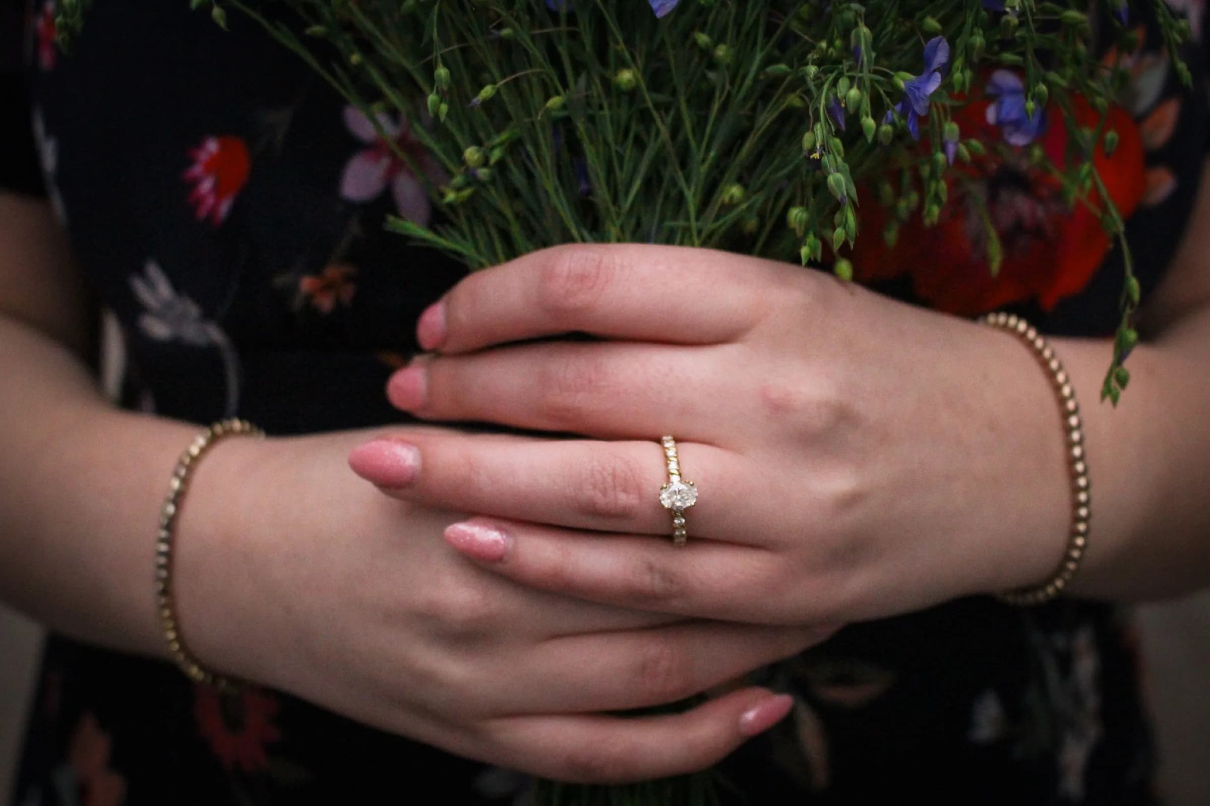 Hands, engagement ring, bouquet